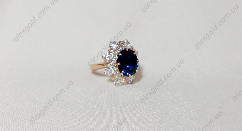 Кольцо женское  с синим камнем
