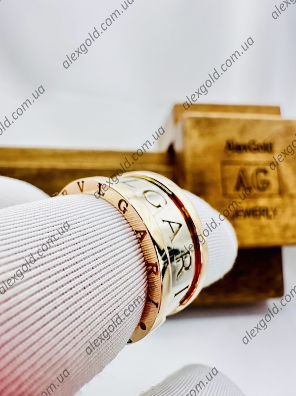 Жіноча каблучка широка Bulgari два види золота 