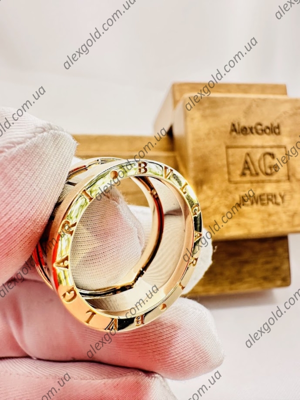 Жіноча каблучка широка Bulgari два види золота 