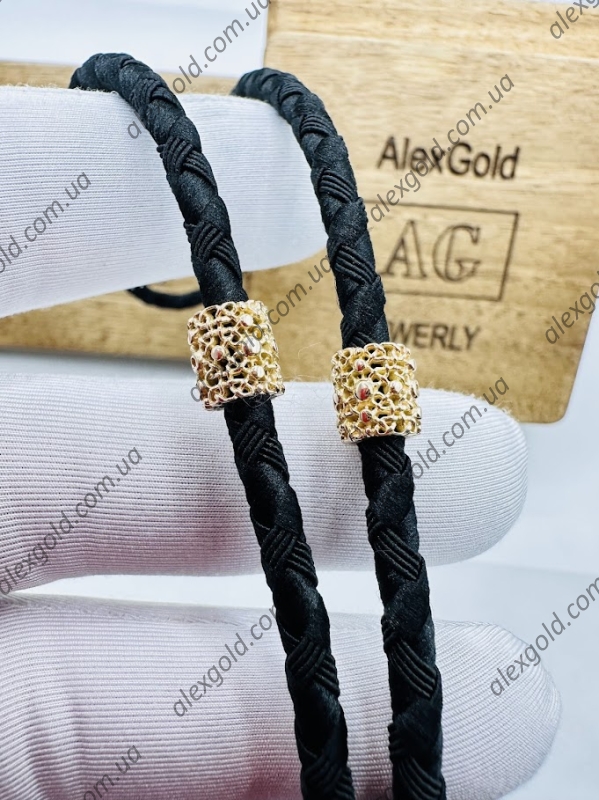 Шнурок з золотоми вставками та камнями вага 13.3г Шнурок з золотоми вставками та камнями вага 13.3г