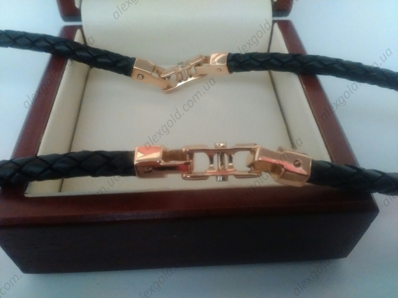 Плетеный кожаный шнурок с золотыми вставками бренда Baraka
