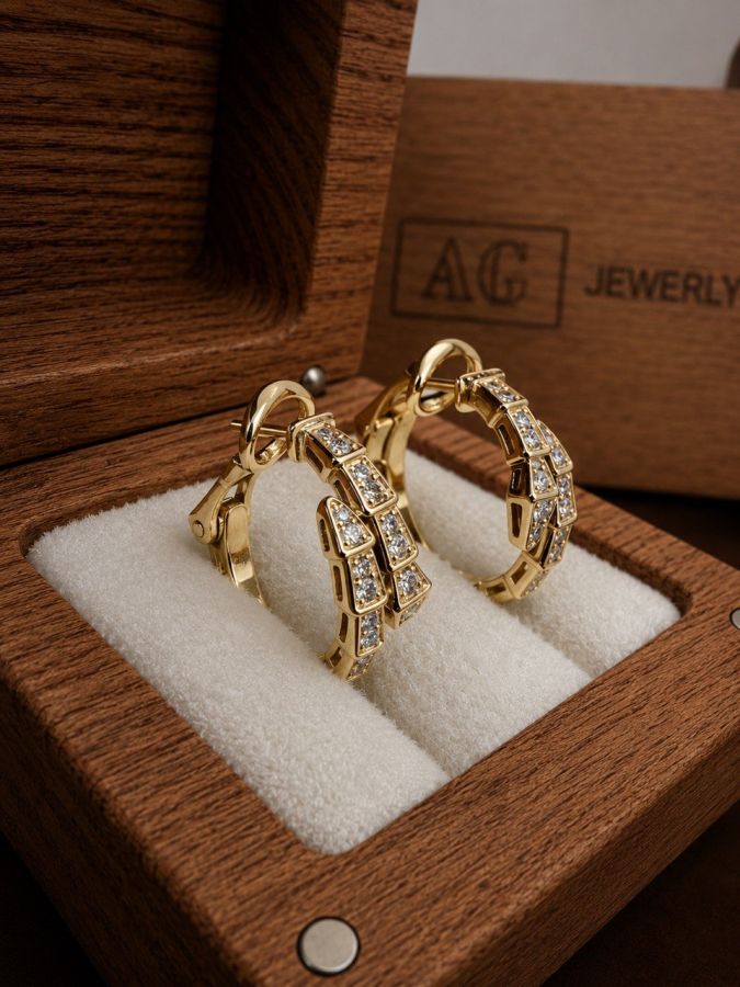 Золоті сережки Bulgari змія