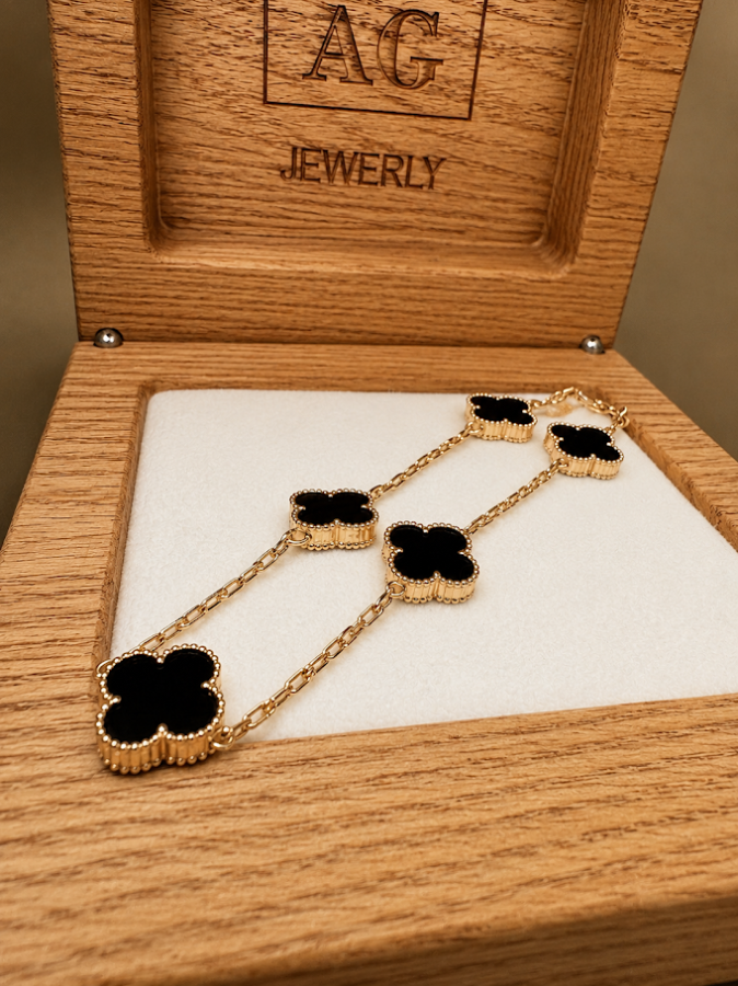 Золотий браслет Van Cleef з натуральним оніксом